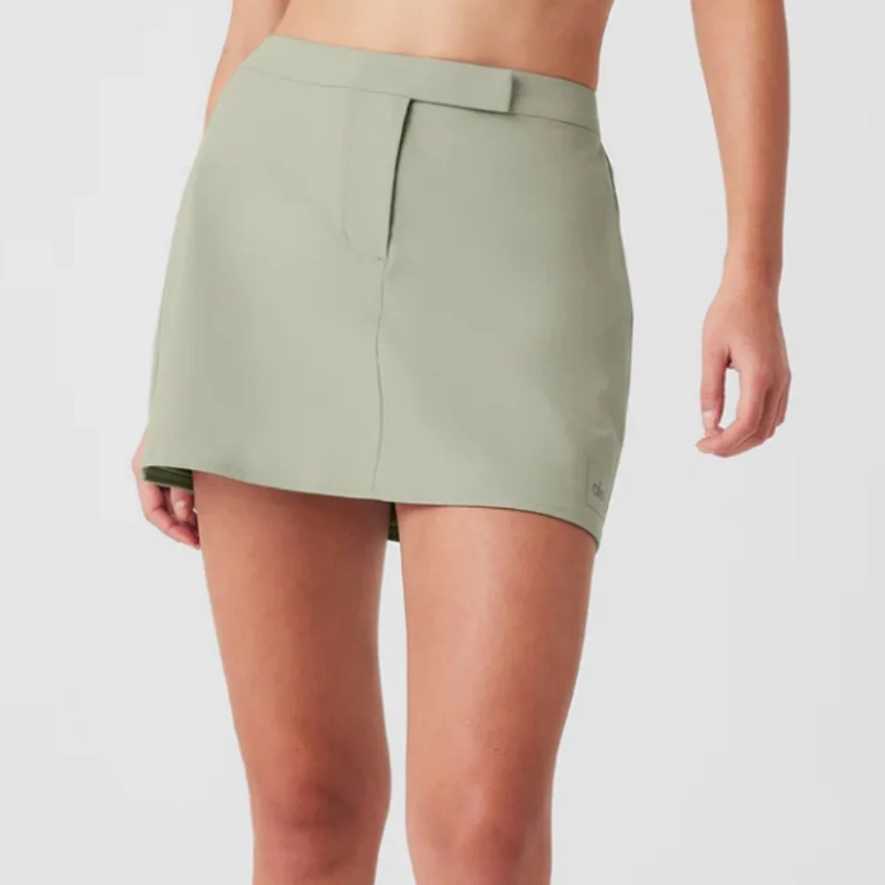 ALO | LIGHT GREEN HIGH SPEED MINI SKIRT IN LIMESTONE | XS
